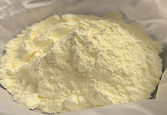 Appearance image for 6-amino-7-bromo-2,3-dihydro-1H-inden-1-one