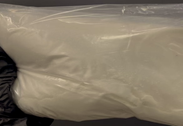 Appearance image for 3-(2-(2-(2-((4-((3-Chloro-4-fluorophenyl)amino)-7-methoxyquinazolin-6-yl)oxy)ethoxy)ethoxy)ethoxy)propanoic acid